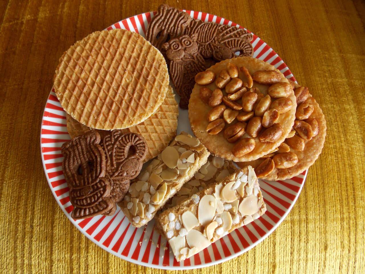 Dutch biscuits on a plate - speculaas - jan hagel - pindakoeken - stroopwafels  - big bite dutch treats 