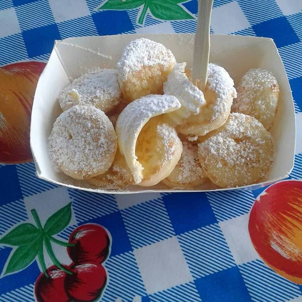 little dutch pancakes served with icing sugar and butter  - Big Bite Dutch Treats
